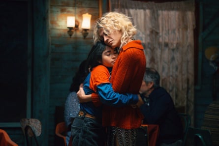 A girl and a woman hugging