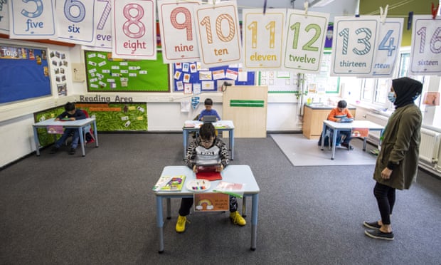Children maintain social distancing at Earlham primary in London