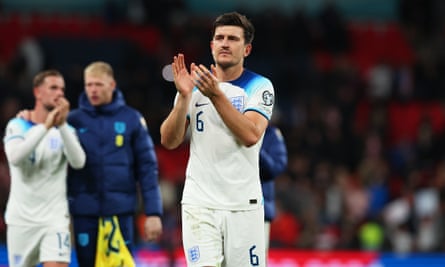 Harry Maguire applauding England fans after full time at Wembley Stadium.