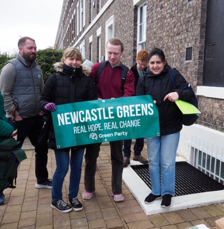Green party supporters with a banner saying ‘Real hope, real change’