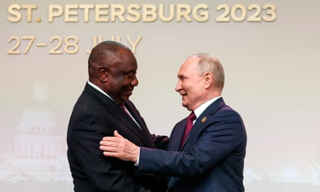 President of the Republic of South Africa Cyril Matamela Ramaphosa and Russian President Vladimir Putin shake hands before an official ceremony to welcome the leaders of delegations to the Russia Africa Summit in St. Petersburg, Russia, 27 July.