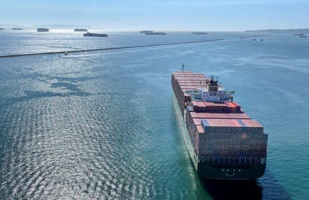 Dozens of container ships wait off the coast of the congested ports around Los Angeles.