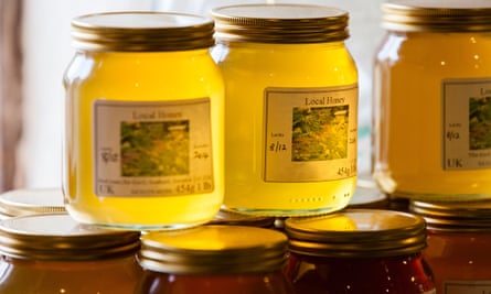 Honey stacked in jars.
