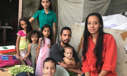 Ivan Henríquez with his wife and six children at their home in Barquisimeto