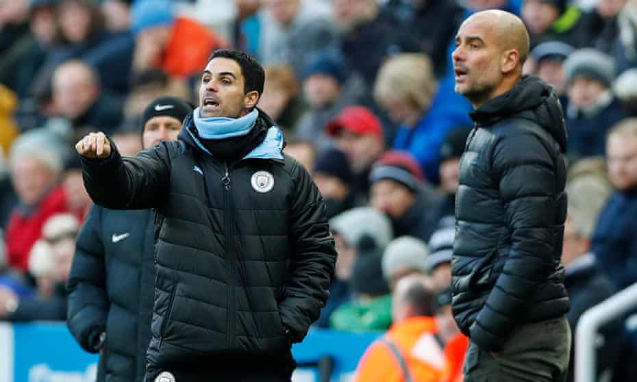 Mikel Arteta (left) on the Manchester City touchline alongside Pep Guardiola five days before becoming the Arsenal manager.