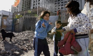 Children play in the Hidden City settlement.