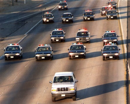 a white car is chased by police cars