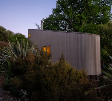 housing – Kaka Pod by Rafe Maclean ArchitectsThis compact, triangular 60sqm home follows the sloping topography, while its curved corners soften its presence in the landscape. The judges said the openings were thoughtfully placed to frame the views and the interior bunkroom loft was a charming addition.