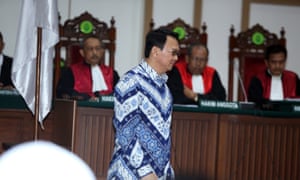 Governor Basuki Tjahaja Purnama, popularly known as Ahok, arrives in court for the verdict and sentencing in his blasphemy trial.