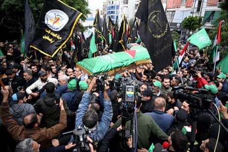 People carry the coffin of Hamas deputy chief Saleh al-Arouri to the Imam Ali Mosque at Tariq Al-Jadida district of Beirut, Lebanon on 4 January.