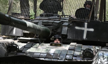 Ukrainian servicemen in a military vehicle in the Donetsk region.