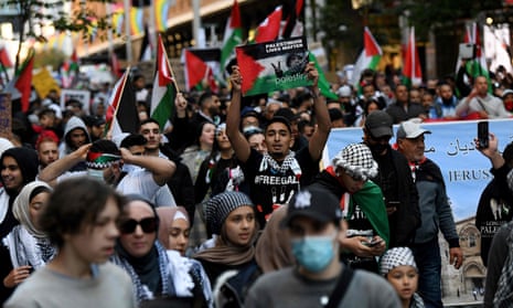Protesters march in a Free Palestine demonstration in Sydney