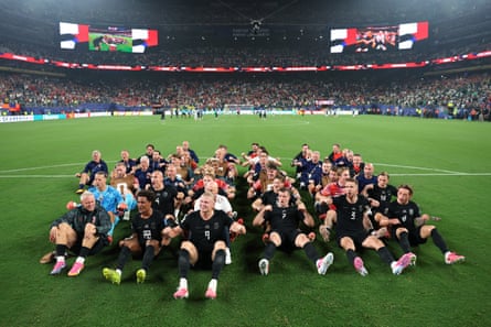 Erling Haaland and his Norway teammates join their fans in their trademark rowing celebration post-match