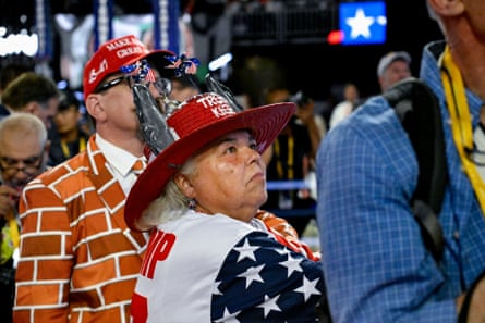 An older woman in a Trump hat and a stars-and-stripes shirt.