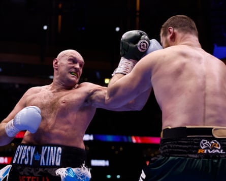 Tyson Fury lands a punch against Arslanbek Makhmudov