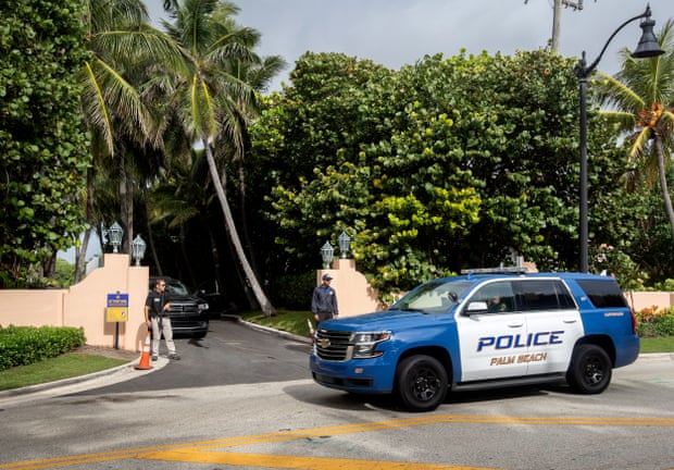 Police authorities outside Mar-a-Lago in Palm Beach, Florida yesterday
