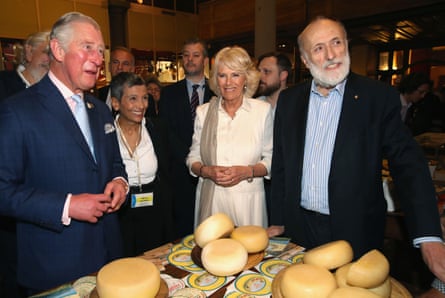 Carlo Petrini, right, with the then Prince Charles, Prince of Wales, and Camilla, Duchess of Cornwall, during a vistit to the Sant'Ambrogio market to celebrate the Slow Food movement and meet local food producers of the Abruzzo region in 2016.