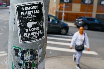 A person walking past a flyer