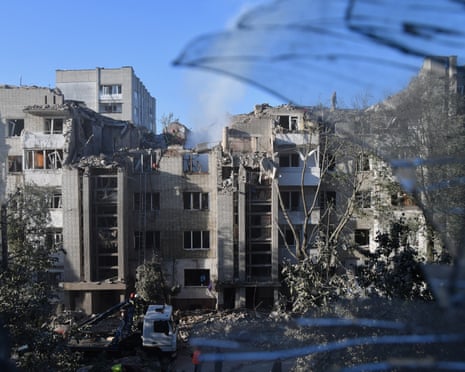 Rescuers search through the rubble of a residential building following an air attack in Lviv, Ukraine.