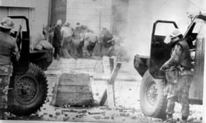 Soldiers use CS gas against rioters in Derry, 30 January 1972.