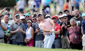 Rory McIlroy plays a shot on the 16th during his third round at the Arnold Palmer Invitational in Orlando, the day after his return visit to Disney World.