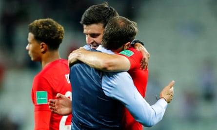 Gareth Southgate embraces Harry Maguire after England’s win 2-1 Tunisia.