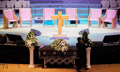Funeral for Tyre Nichols, in MemphisA man arranges flowers around Tyre Nichols' casket at Mississippi Boulevard Christian Church in Memphis, Tenn., on Wednesday, Feb. 1, 2023.