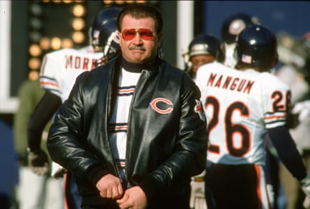 Mike Ditka stands on the sidelines during a Chicago Bears game.