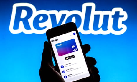 Revolut Visa Card on a smartphone screen with a  logo in the background