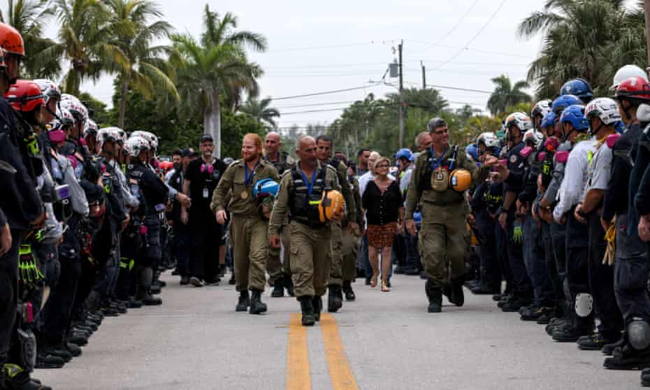  Members of the Israel Defense Forces’ (IDF) national rescue unit are given a send off by search and rescue personnel in Surfside, Florida, on Saturday.