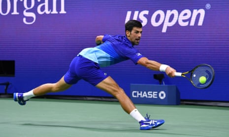 Novak Djokovic hits a return during his four-set victory over Jenson Brooksby. 