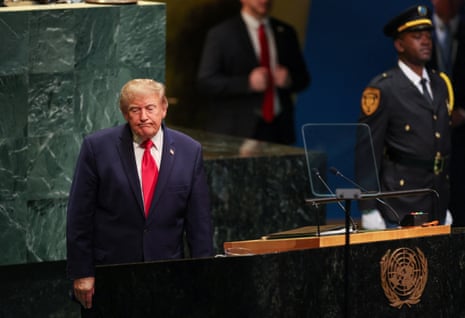 a man stands at a podium
