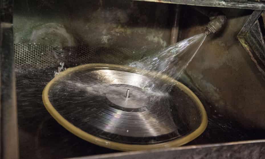 Back in the groove … a master copy of a vinyl record is cleaned before being submerged into nickel plating solution.