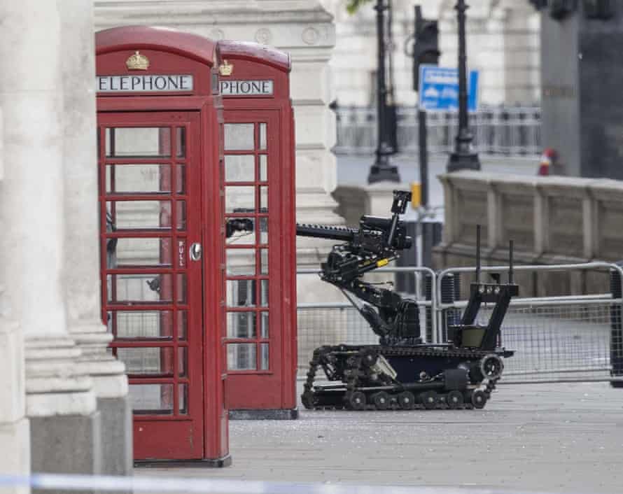 A robot dealing with a suspect package in Whitehall today.