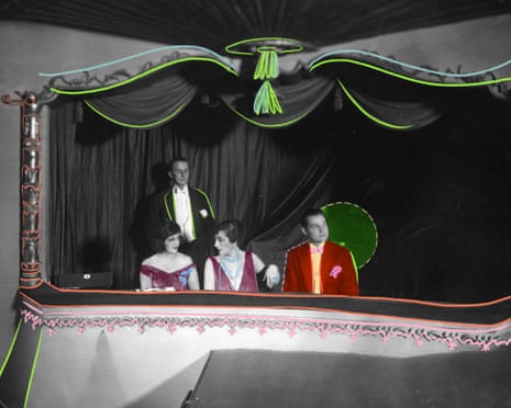 Concert-goers in a viewing box at a premiere