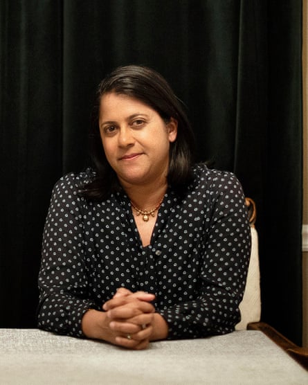 a woman in a polka dot shirt