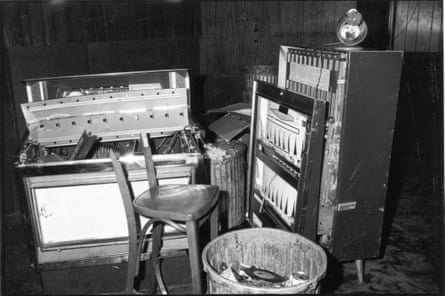 View of a damaged jukebox and cigarette machine, along with a broken chair, inside the Stonewall Inn (53 Christopher Street) after riots over the weekend of June 27, 1969. The bar and surrounding area were the site of a series of demonstrations and riots that led to the formation of the modern gay rights movement in the United States.