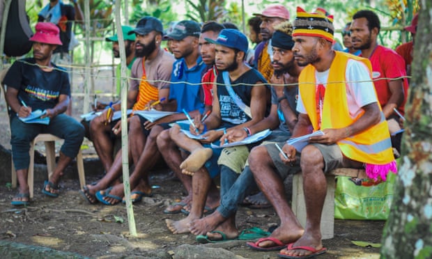 Scrutineers observe the polling at Rai Coast, Madang