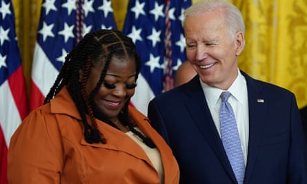 Joe Biden presents the Presidential Citizens Medal to the Georgia election worker Shaye Moss.