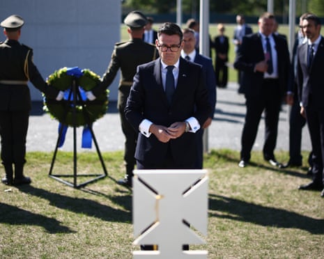 Prime Minister Andy Burnham lays flowers during a ceremony at Ukraine's national military memorial cemetery in Hatnem southwest of Kyiv, during his first foreign trip, to mark Ukraine's independence day and signal the UK's continued support for the country under his administration.