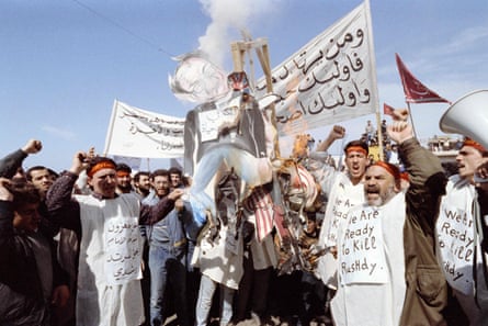 Pro-Iranian Hezbollah fundamentalists burn an effigie of British writer Salman Rushdie in 1989.