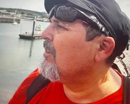 A police handout photo of Claudio Aquilino in front of a bay