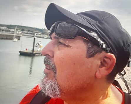 A police handout photo of Claudio Aquilino in front of a bay