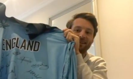 Buttler holds up his shirt from the 2019 World Cup final.
