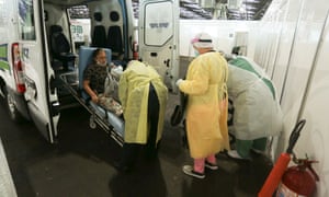 A coronavirus patient is transported amid the coronavirus outbreak in Sao Paulo, Brazil, 7 Jul 2020.