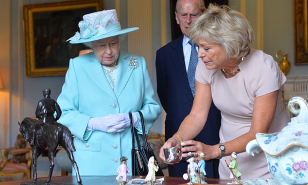 Queen Elizabeth II and the Duke Of Edinburgh with Antiques Roadshow expert Hilary Kay, 2014.