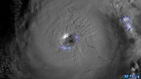 Lightning crackles around eye of Hurricane Ian – video 