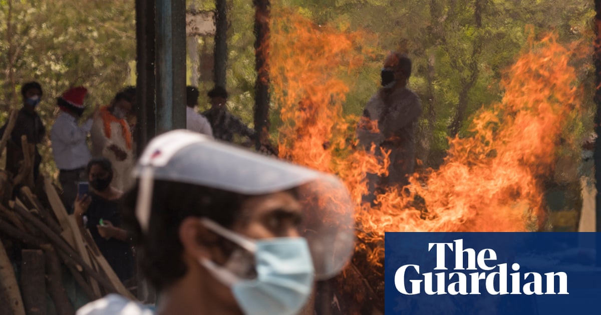 India Covid crisis: families' plea for help amid oxygen shortages and mass cremations – video report - The Guardian