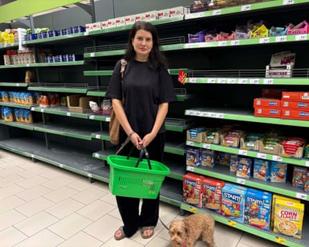 Dariya Malyukova shopping for groceries a Novus supermarket in Kyiv.