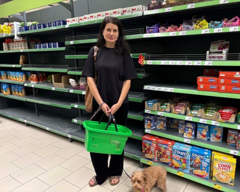 Dariya Malyukova shopping for groceries a Novus supermarket in Kyiv.